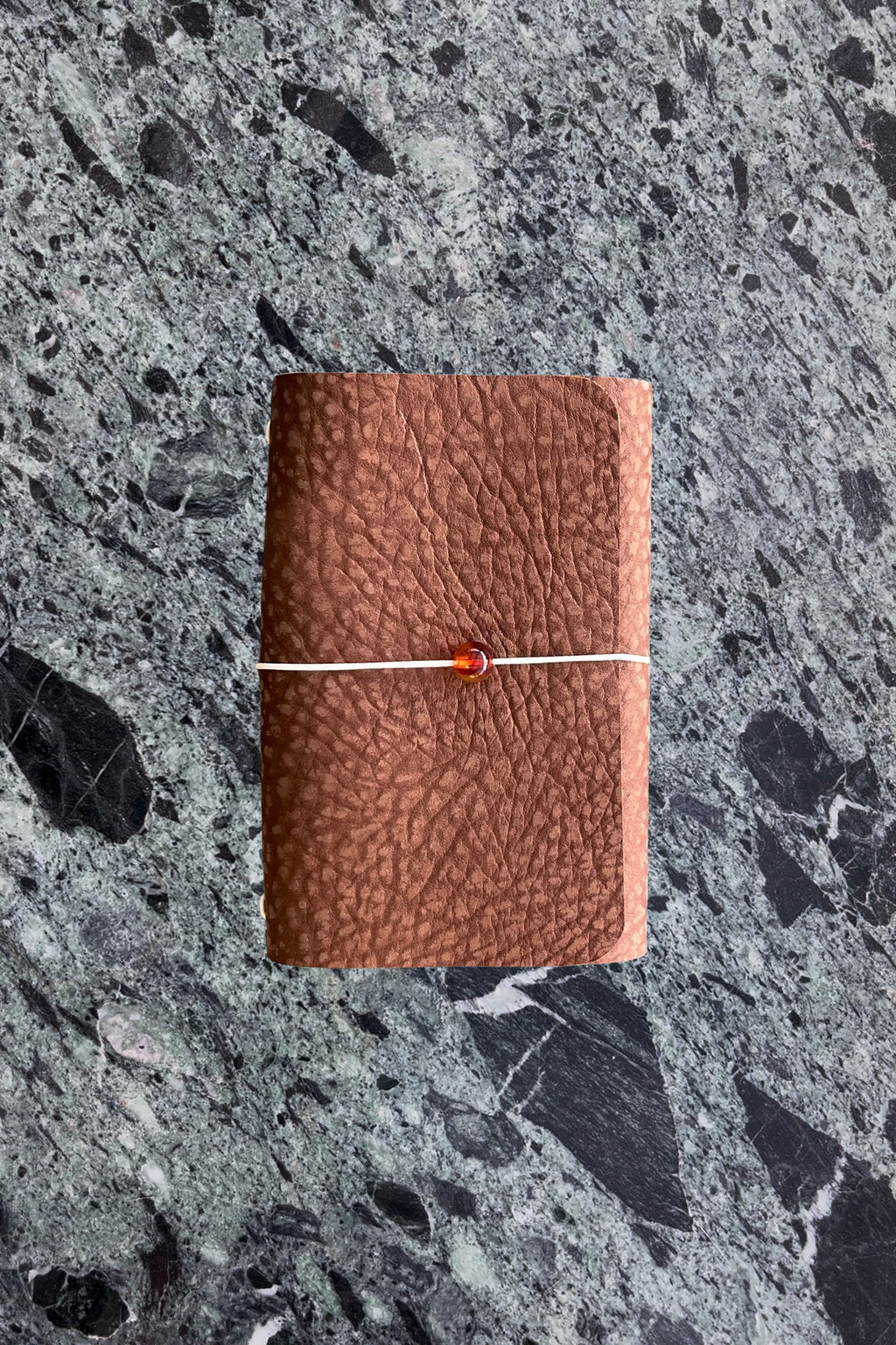 A6 brown textured
