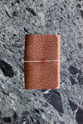 A6 brown textured