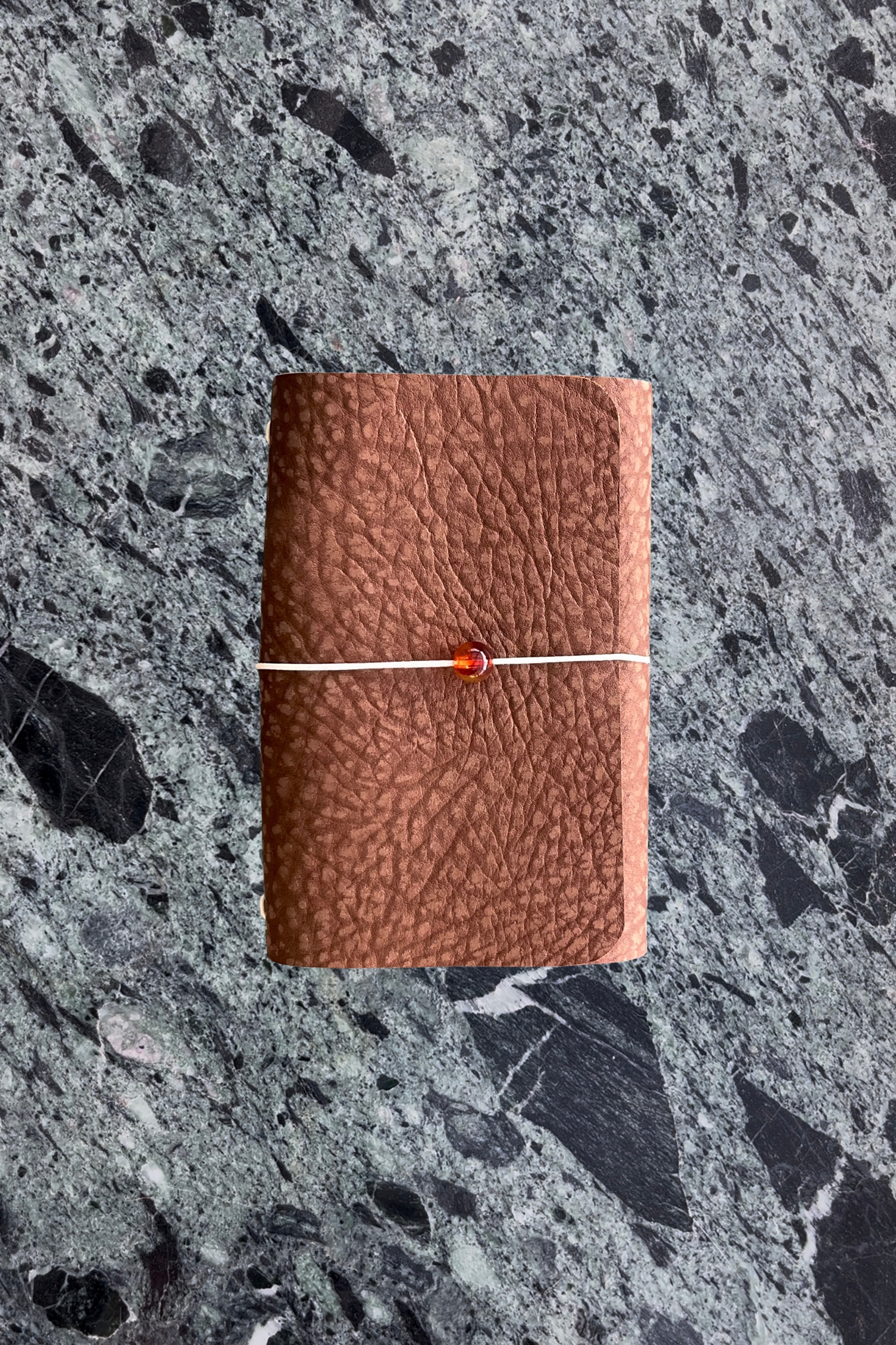 A6 brown textured